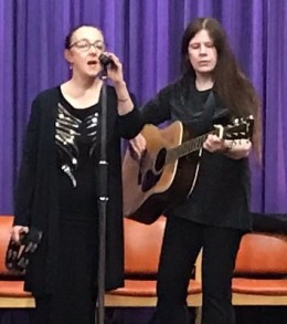 Karen and Sheena performing on stage