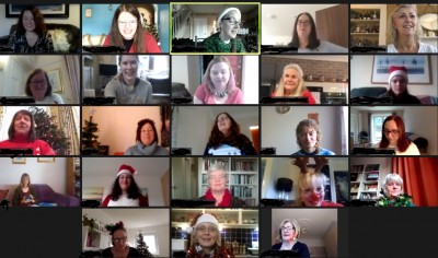 Screenshot of Session attendees on Zoom dressed up for our Christmas celebration