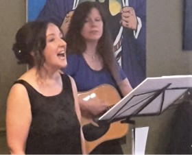 Karen and Sheena performing